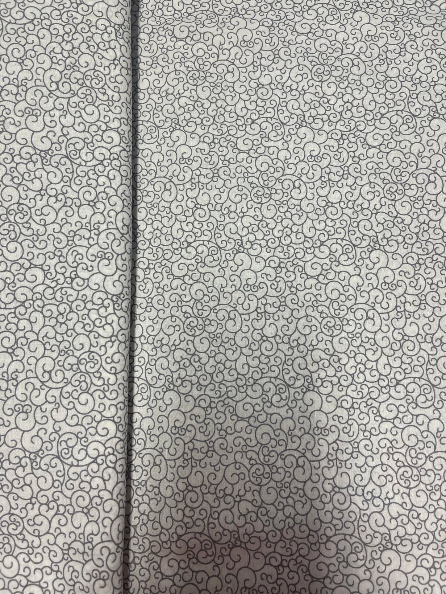 Tissu coton blanc avec imprimé gris