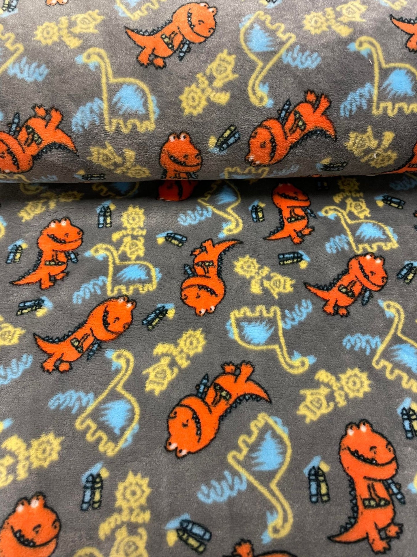 Tissu molleton imprimé dinosaures