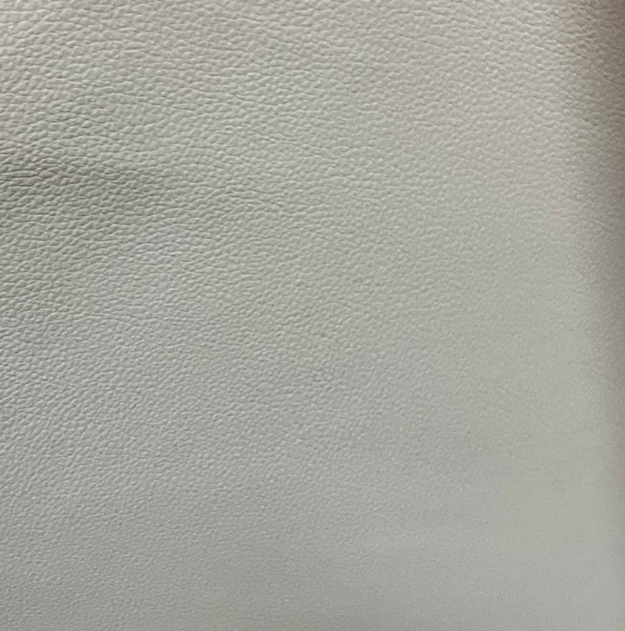 Tissu en cuirette blanc cassé