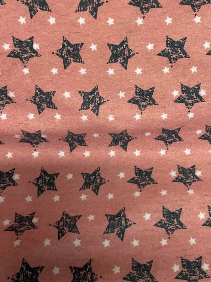 Tissu flanelle rose imprimé étoiles