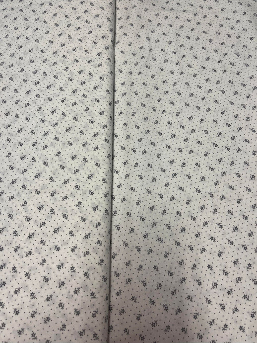 Tissu coton imprimé fleurs grises