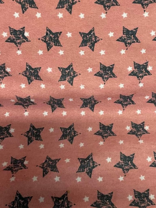 Tissu flanelle rose imprimé étoiles