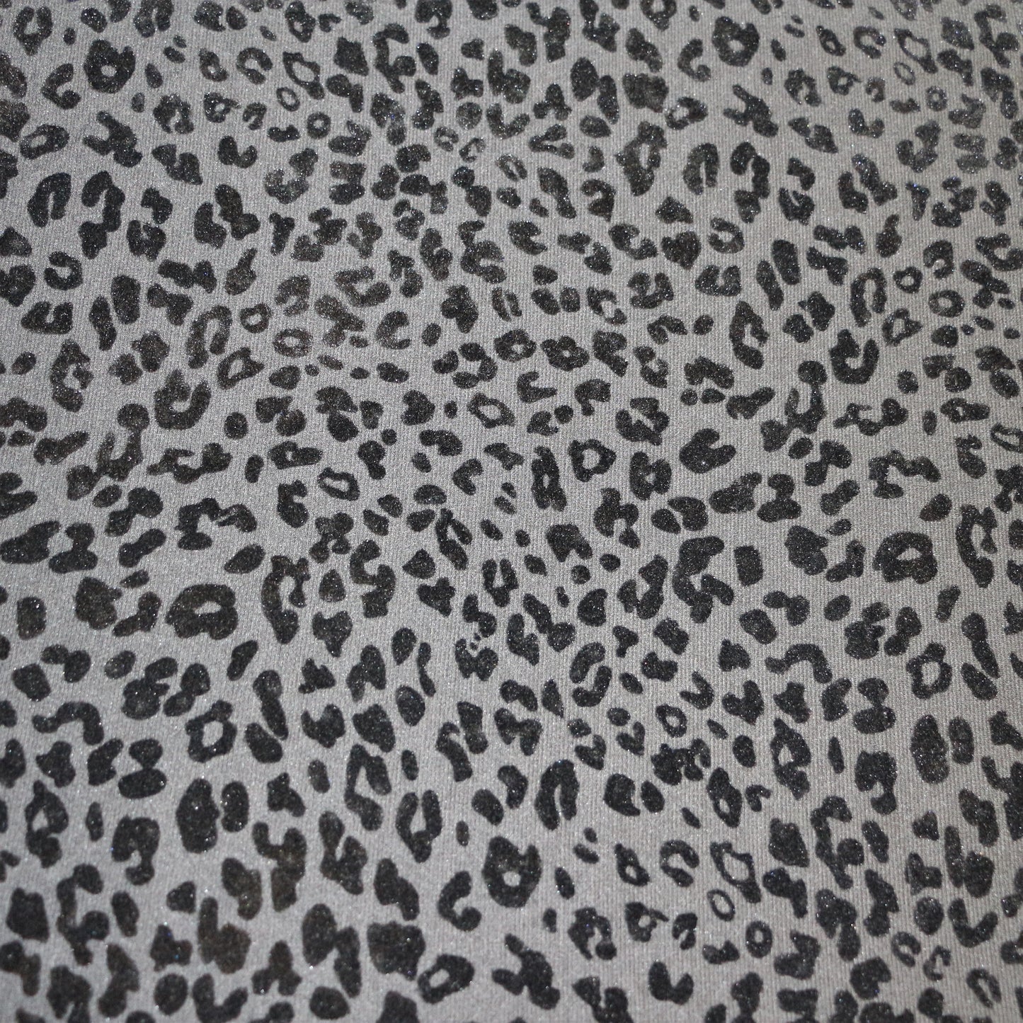 Tissu tricot à motif Jaguar style suède